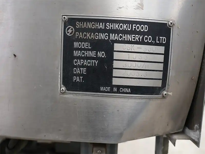 Shanghai SHIKOKU CSK Roof Carton Filling and Sealing Machine nameplate.jpg