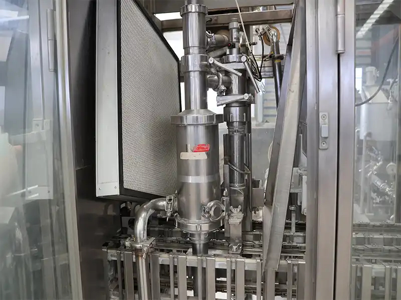 Shanghai SHIKOKU CSK Roof Carton Filling and Sealing Machine filling.jpg